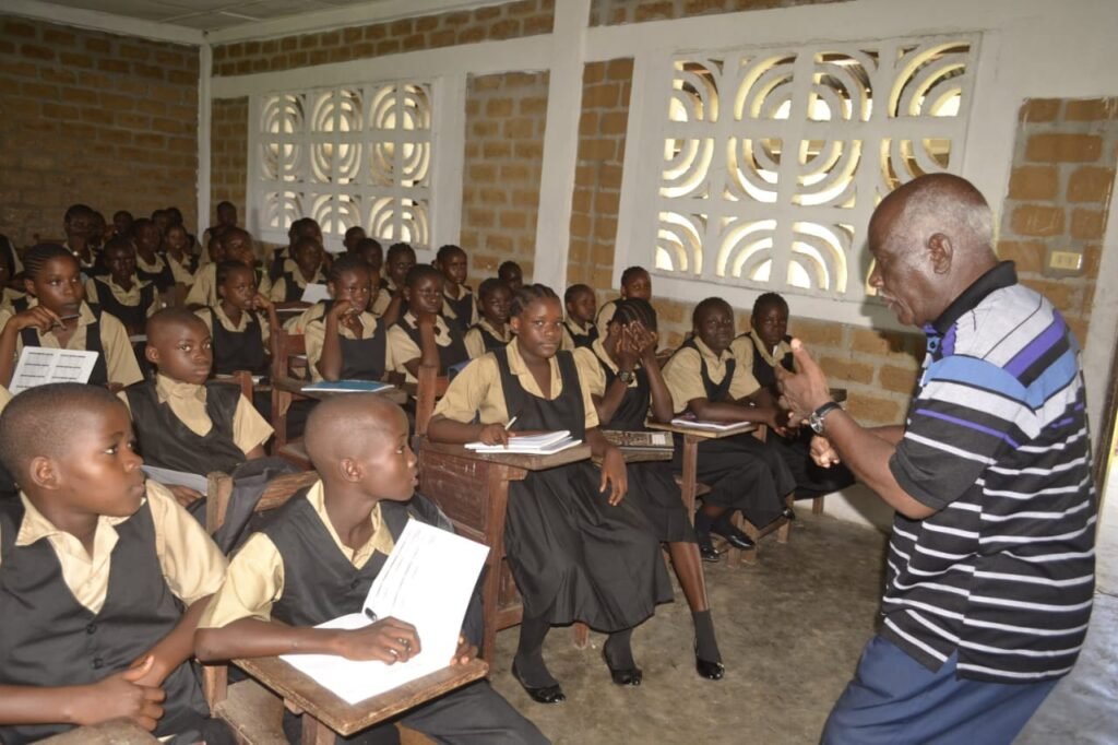 Bishop Dr. Leo M. Simpson inspiring the kids in the classroom