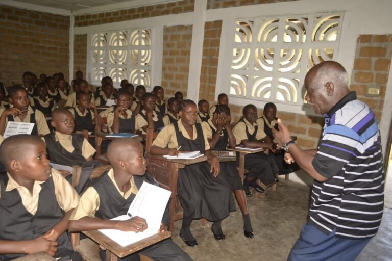 Bishop Dr. Leo M. Simpson inspiring the kids in the classroom
